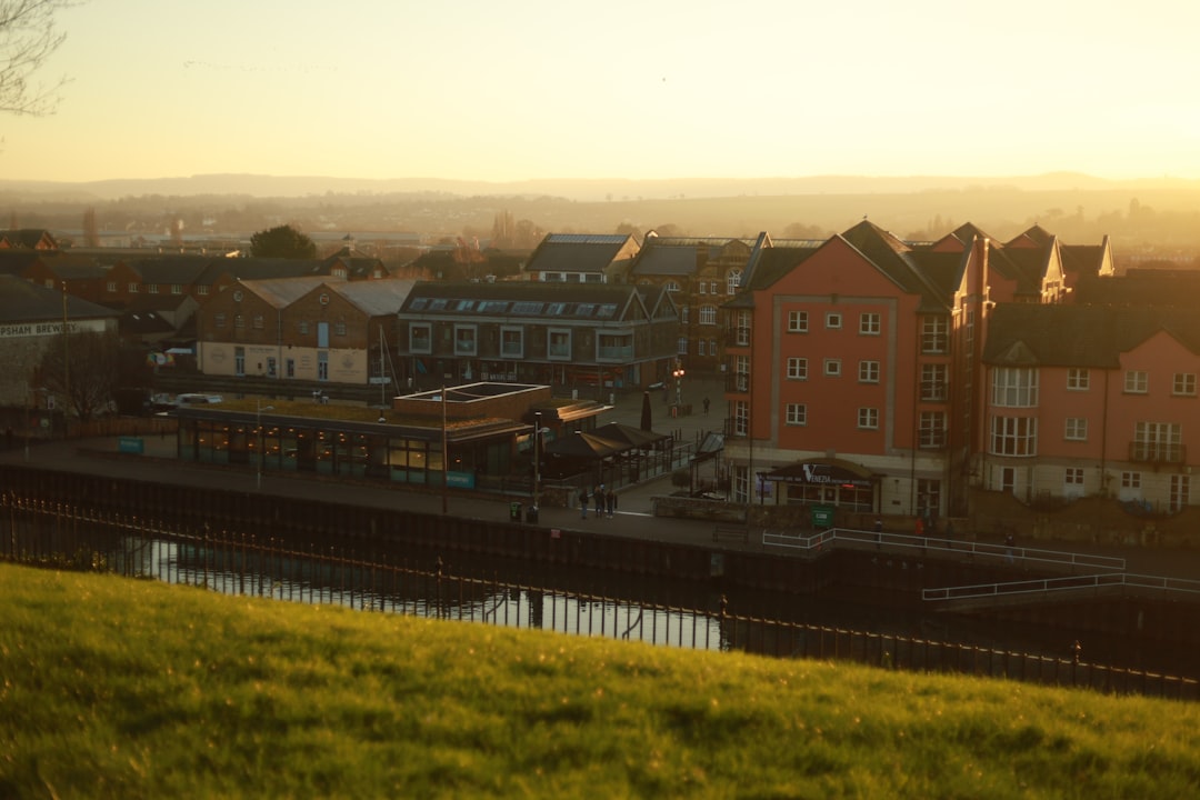 Exeter, Devon: a group of buildings with a road in front of them
